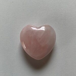 Pink quartz heart shaped crystal